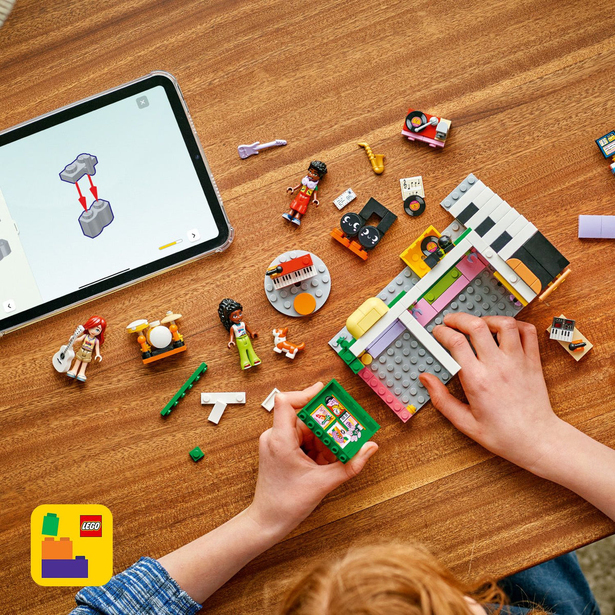 LEGO Friends 42653 Negozio di musica e appartamento