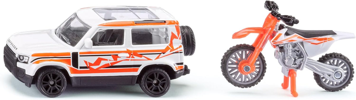 land rover defender con  ktm motorbike